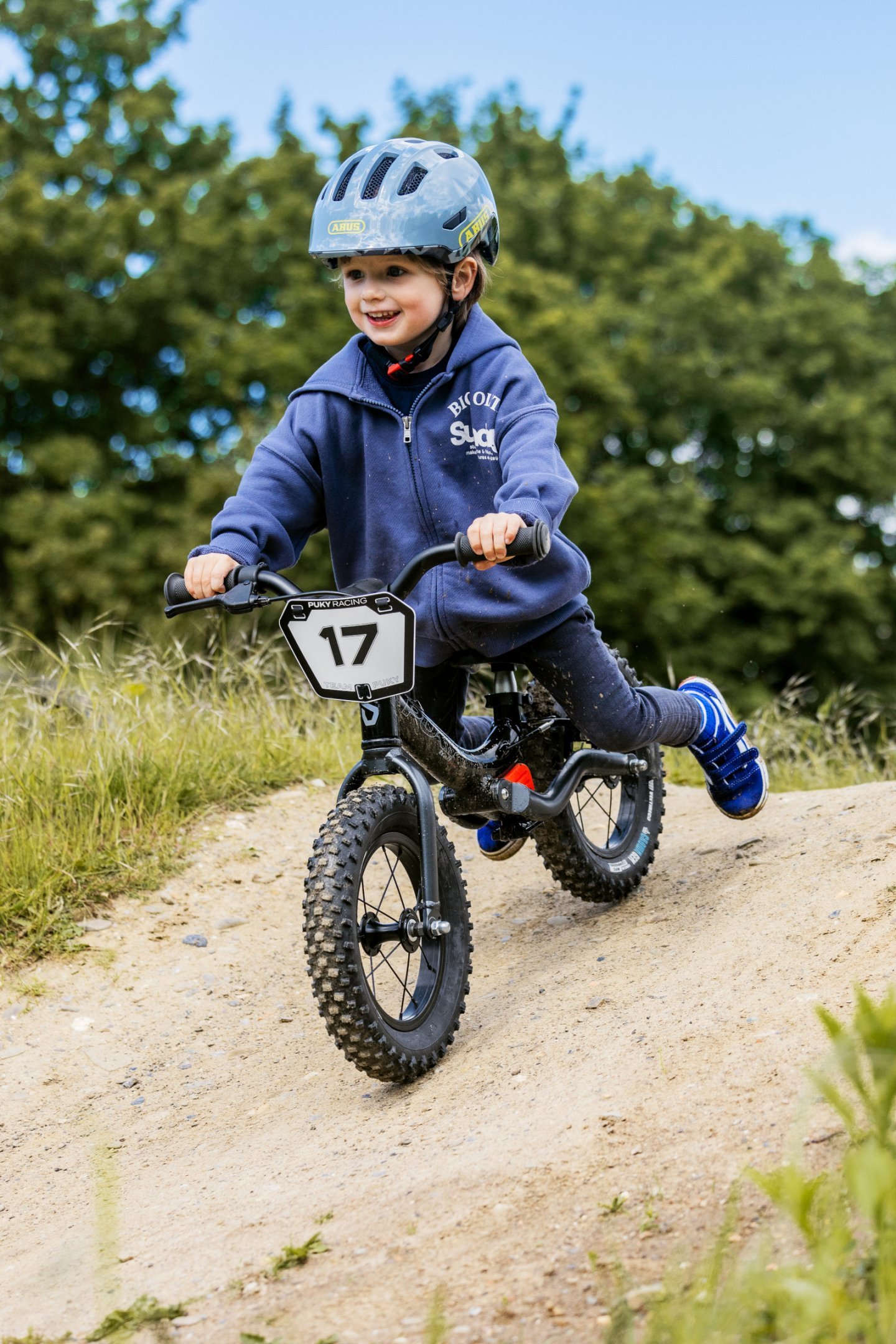 Puky LR TRAIL PRO – 12.5″ Children’s Balance Bike – midnight black image of child riding Puky LR TRAIL PRO - 12.5" Children's Balance Bike - midnight black for sale on Planet of Bikes